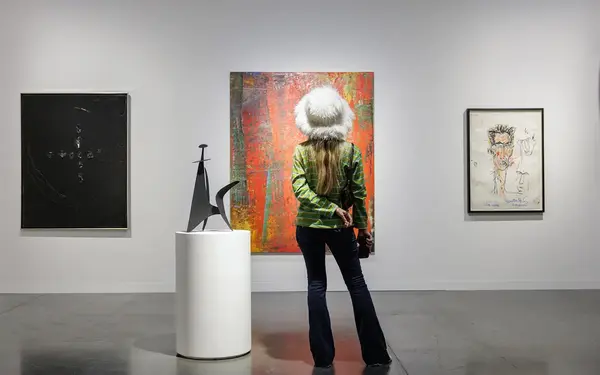 Woman enjoying the art at Art Basel Miami Beach
