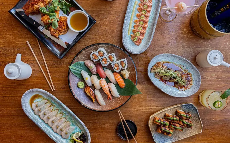 Table spread featuring an assortment of sushi rolls at Blue Ribbon Sushi Bar & Grill