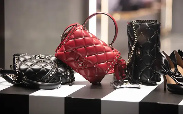 Shoes and purses displayed in a boutique window in the Miami Design District