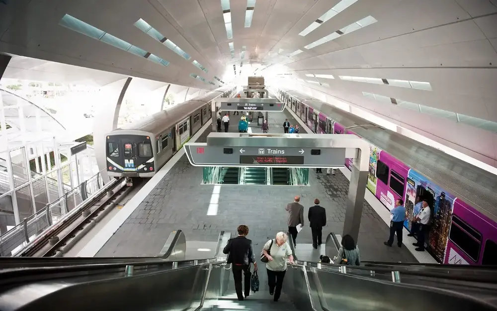 Metrorail and people on the escalator at MIA