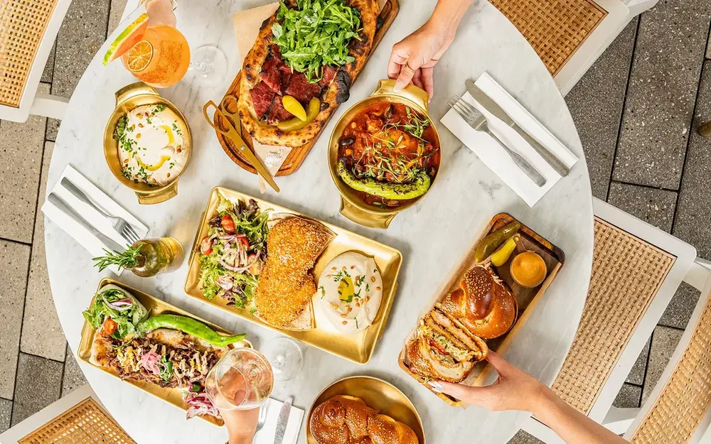 Table filled with Motek’s signature brunch items