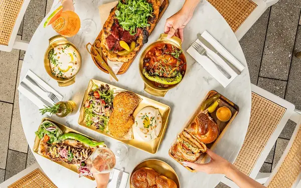 Table filled with Motek’s signature brunch items