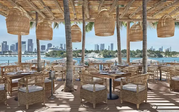 Baia Beach Club waterfront dining area with scenic views