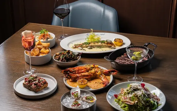 Table spread of seafood at Klaw Miami