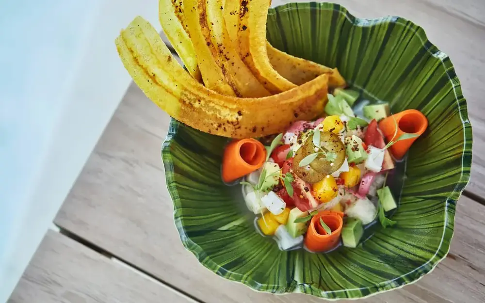 Fresh salad at Four Seasons Surf Club with vibrant greens