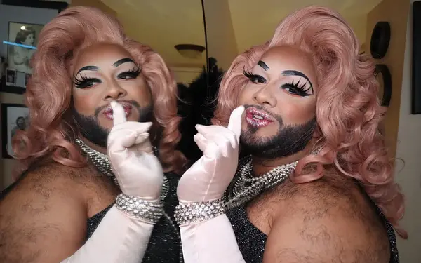 Karla Croqueta posing by a mirror