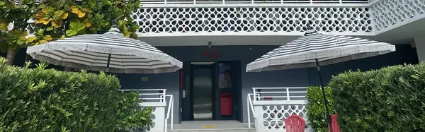 Exterior of Gaythering Hotel with umbrellas