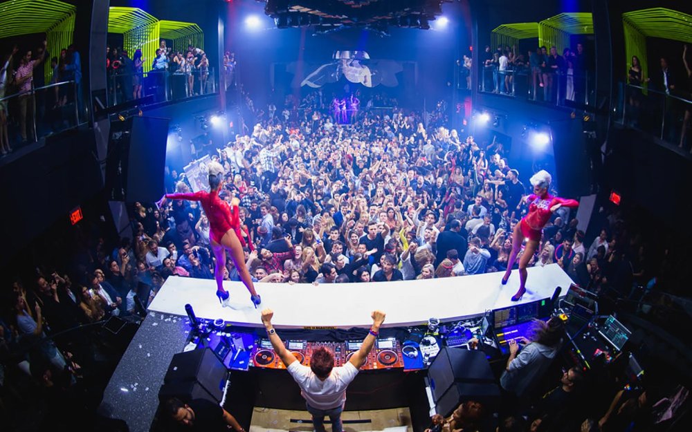Dancers and DJ performing at LIV