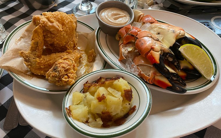 Fried chicken and stone crab claws at Joe’s Stone Crab Fried chicken and stone crab claws at Joe’s Stone Crab