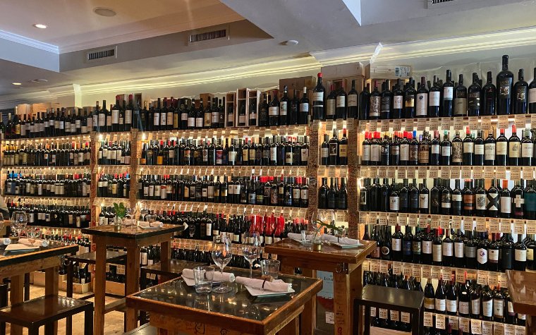 Tables and wine displayed at Happy Wine Tables and wine displayed at Happy Wine