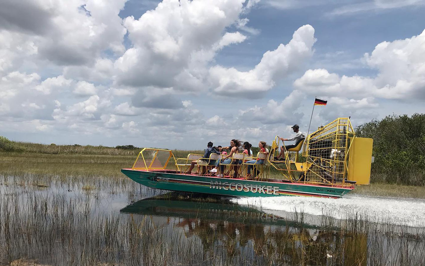 Airboat cruising through the water at Miccosukee Indian Village
