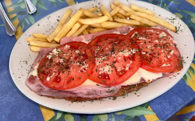 Breaded Steak Napolitana dish served at French Bistro