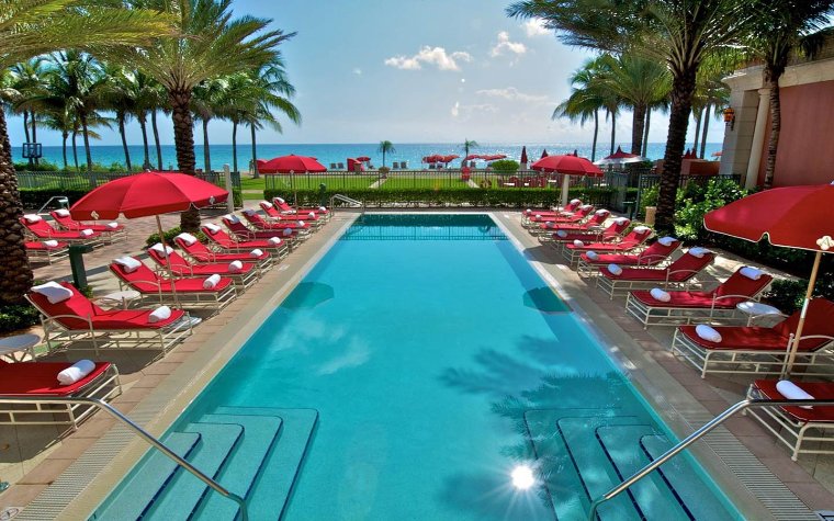 Acqualina's pool area overlooking the beach Acqualina's pool area overlooking the beach