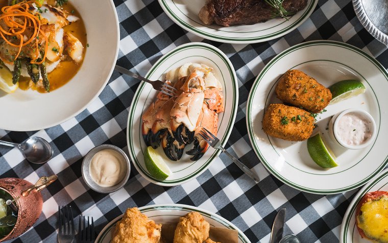 Fresh stone crabs with signature sides at Joe’s Stone Crab Fresh stone crabs with signature sides at Joe’s Stone Crab