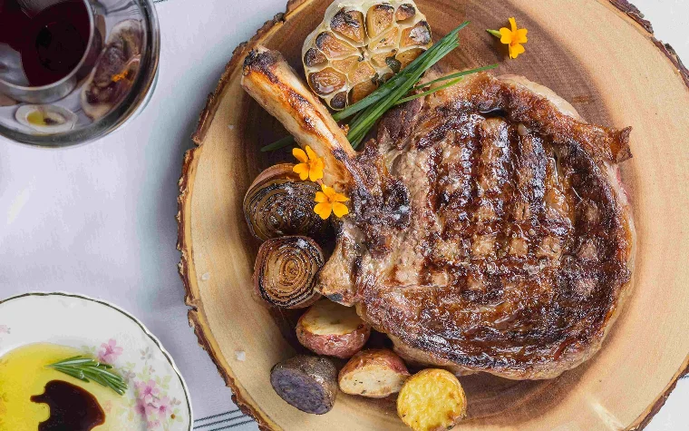 Grilled cowboy steak at Baires Grill