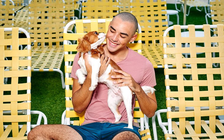 Dog and owner lounging at The Standard Spa