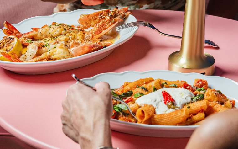 Pasta dish and prawns dish at Casadonna