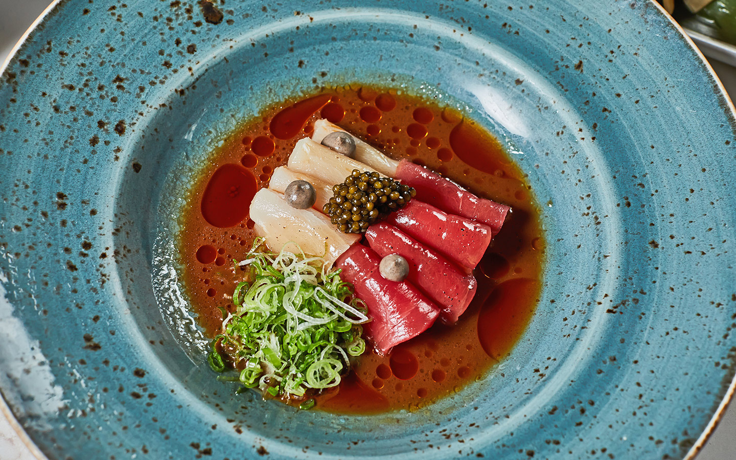 Truffle sashimi dish at Catch Miami Beach