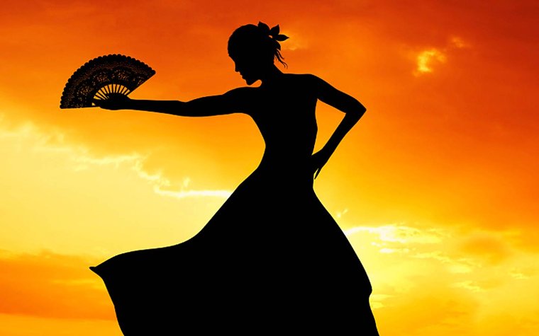 Silhouette of a flamenco dancer striking a pose Silhouette of a flamenco dancer striking a pose