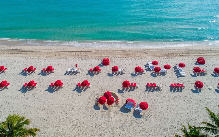 Acqualina's loungers on the beach