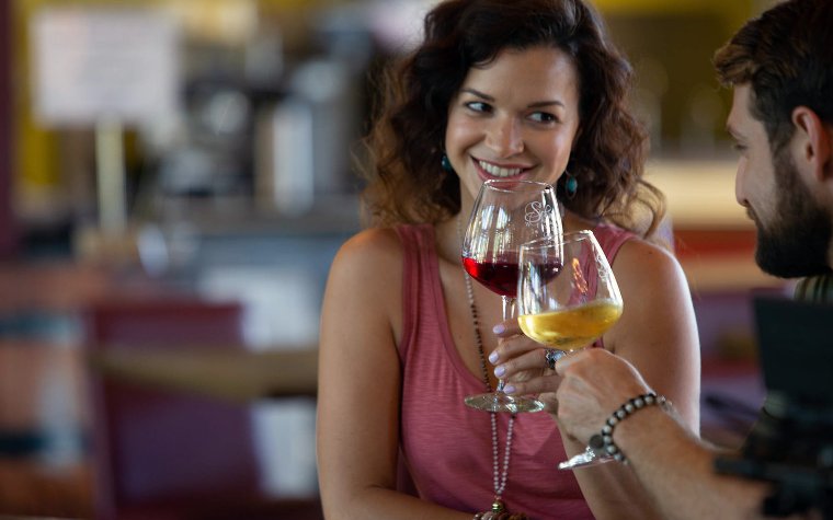 A couple enjoying a wine tasting experience at Schnebly Winery
