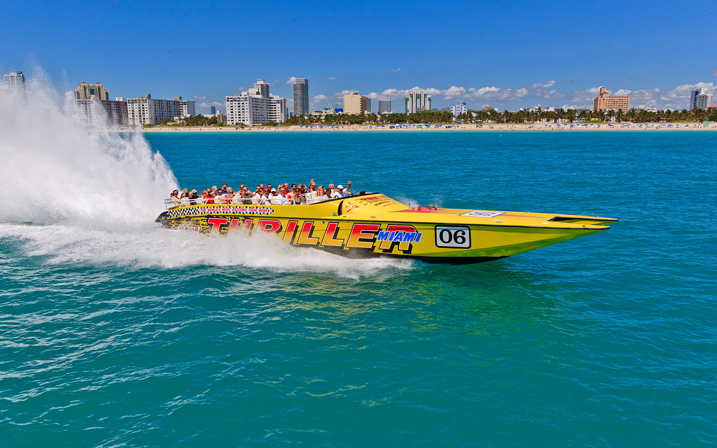 Waving from a yellow Thriller Miami Speedboat in South Beach Waving from a yellow Thriller Miami Speedboat in South Beach