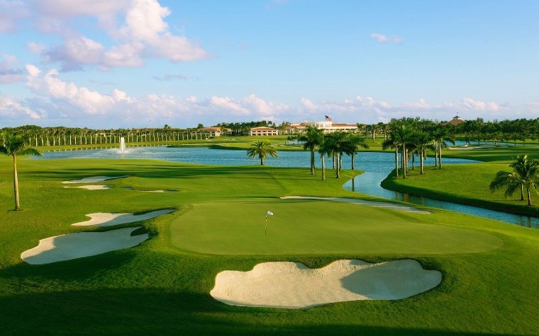 Trump Doral Golf course with green fairways and palm trees Trump Doral Golf course with green fairways and palm trees