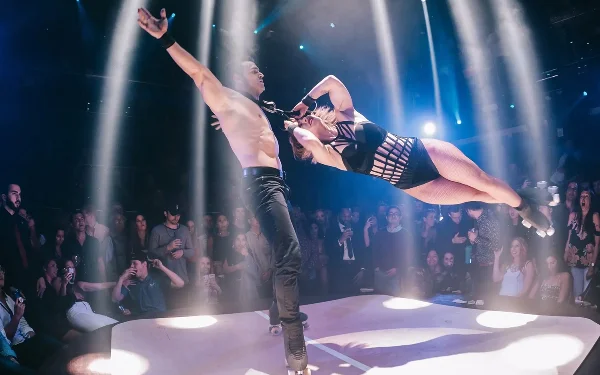 Performers skating on dance floor at E11EVEN