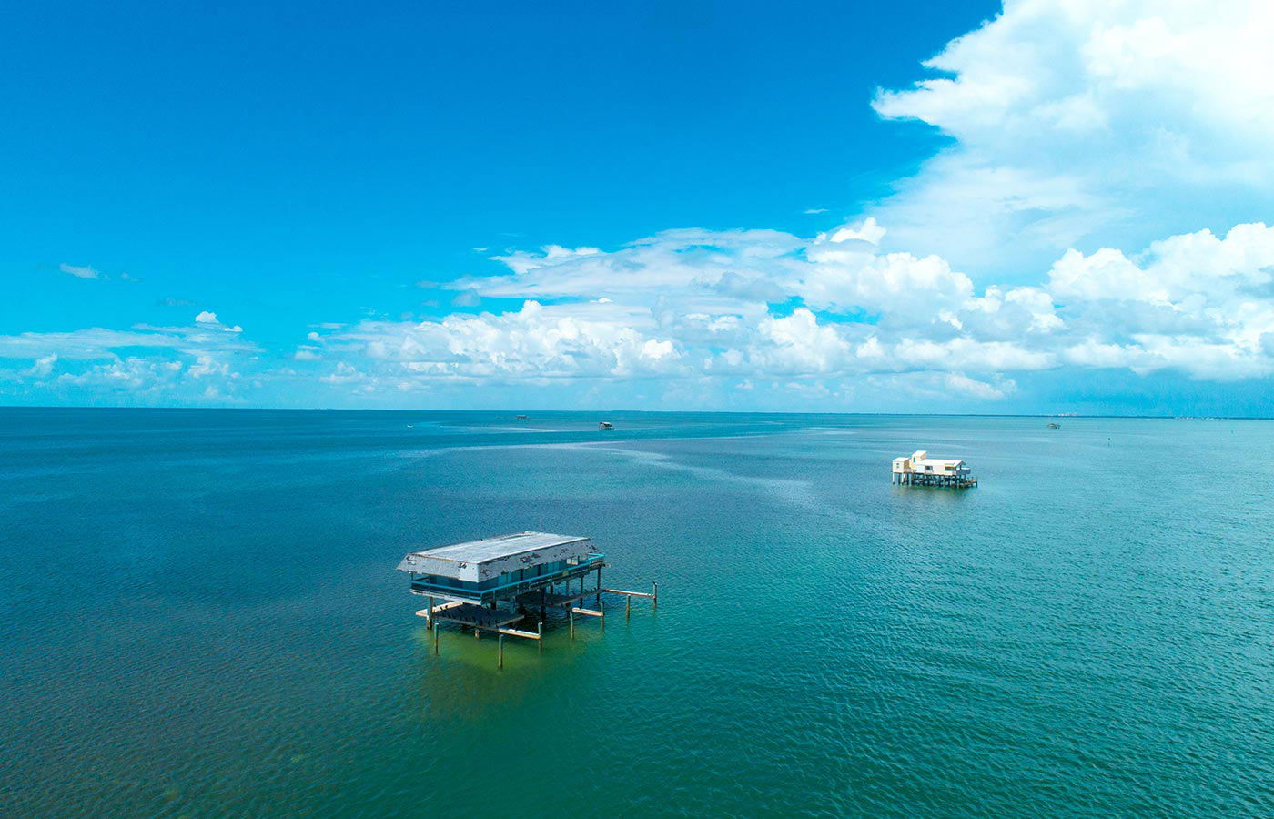 Aerial view of Stiltsville houses in the middle of the ocean