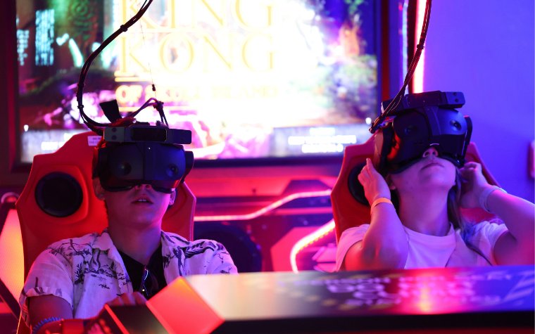 Kids enjoying virtual reality experiences at FunDimension Kids enjoying virtual reality experiences at FunDimension