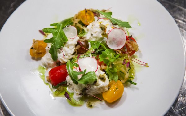 Scarpetta's elegant plating of the burrata salad