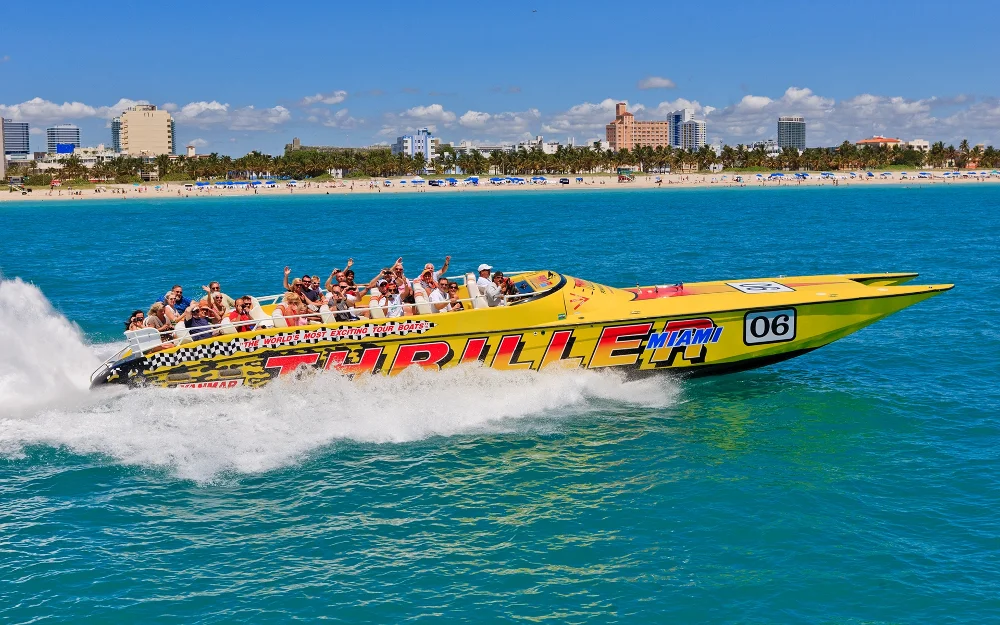 Thriller's yellow speedboat with tour group on the water