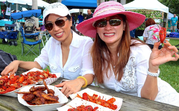 Ladies eating at the Deering Seafood Festival