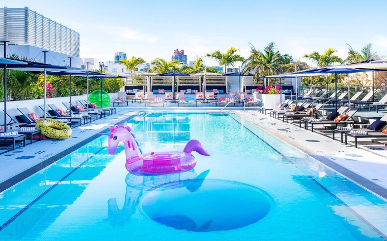 Moxy pool with unicorn float