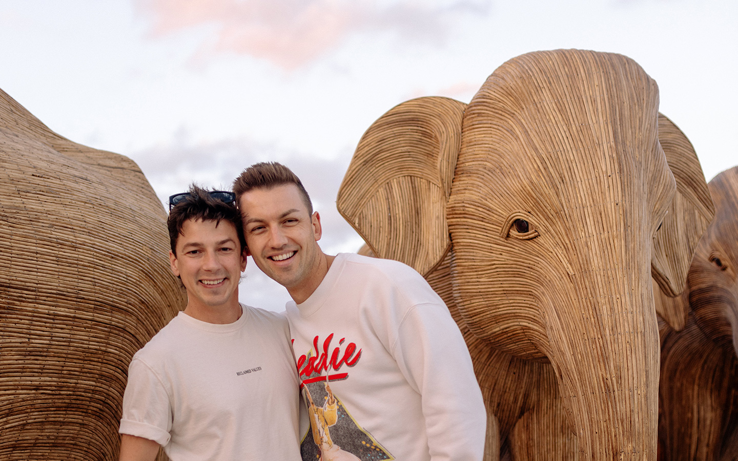 Michael and Matt posing by the Elephant Migration sculptures Michael and Matt posing by the Elephant Migration sculptures
