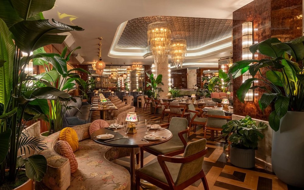 Delilah dining room with elegant tables and warm lighting