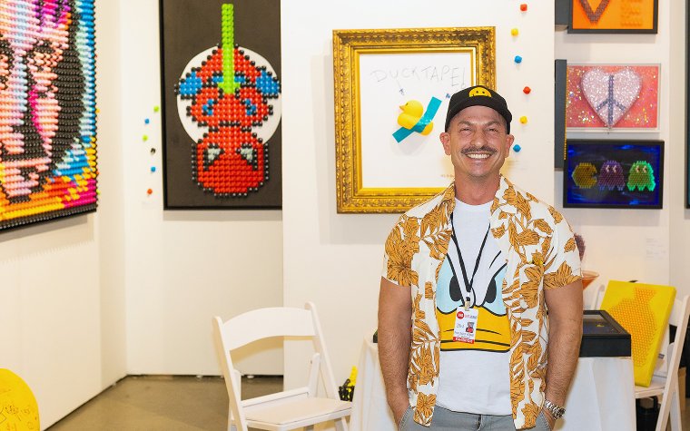 Facundo Yebne poses by his art Facundo Yebne poses by his art