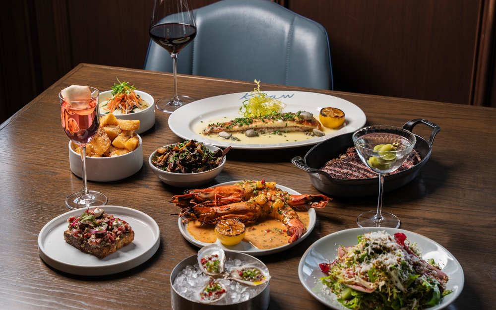 Table spread of seafood at Klaw Miami