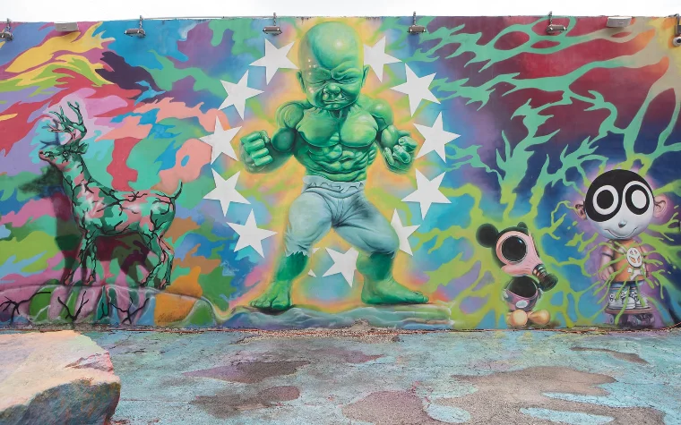 Murals with Angry Baby and mouse at Wynwood Walls Murals with Angry Baby and mouse at Wynwood Walls