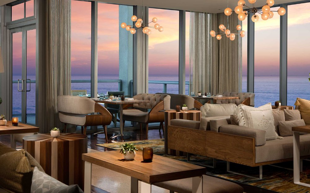 BALEENkitchen's dining room with floor-to-ceiling windows
