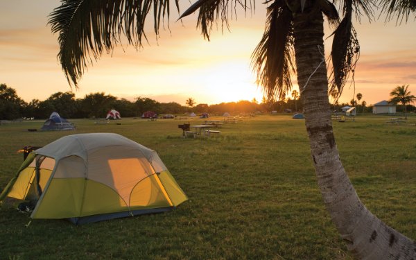Sun rising over tents