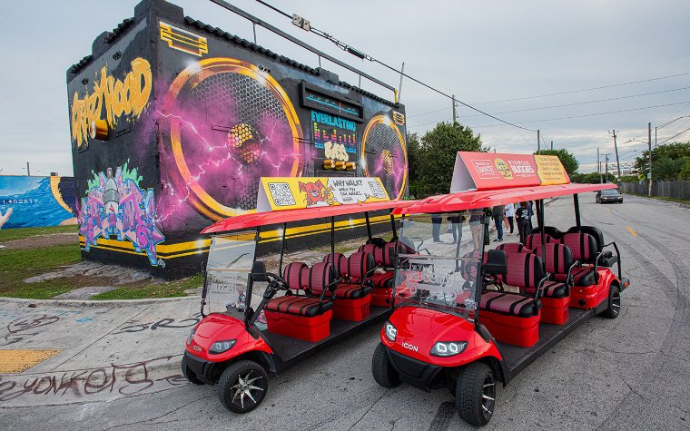 Red buggies parked in Wynwood, Photo by Catalina Cappella