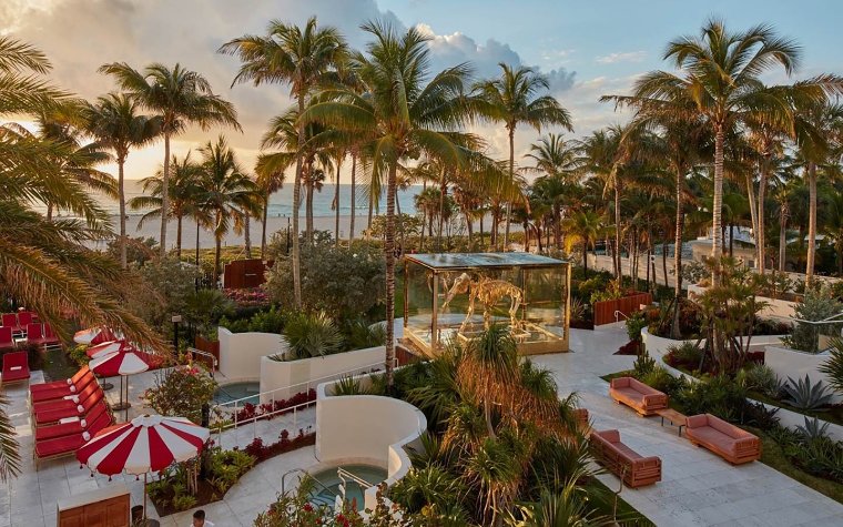Faena's oceanfront pool and gold wooly mammoth sculpture Faena's oceanfront pool and gold wooly mammoth sculpture