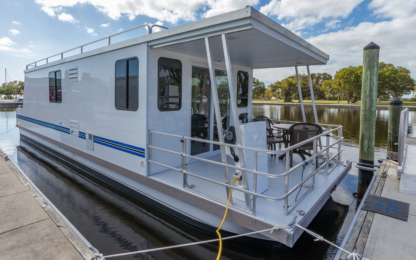 A cozy houseboat docked in Everglades National Park A cozy houseboat docked in Everglades National Park