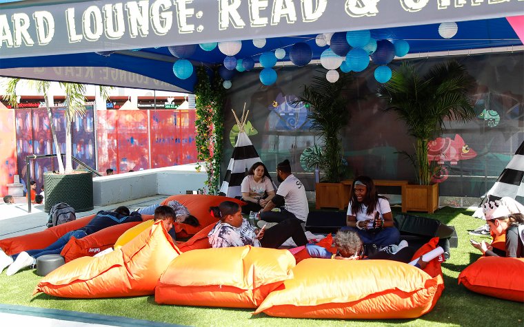 Read and Chill Lounge at Children’s Alley, enjoying cozy beanbags, reading books, and taking a peaceful break from the festivities Read and Chill Lounge at Children’s Alley, enjoying cozy beanbags, reading books, and taking a peaceful break from the festivities