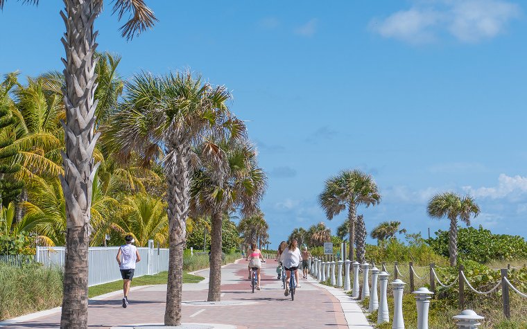People walking & biking on the Beachwalk