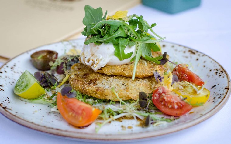 Fried green tomatoes and burrata at Essensia Restaurant Fried green tomatoes and burrata at Essensia Restaurant
