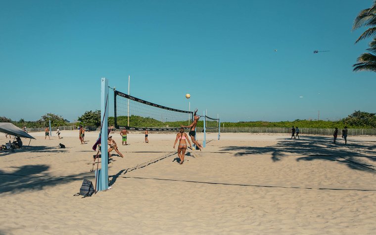 Playing volleyball on the sand at Lummus Park