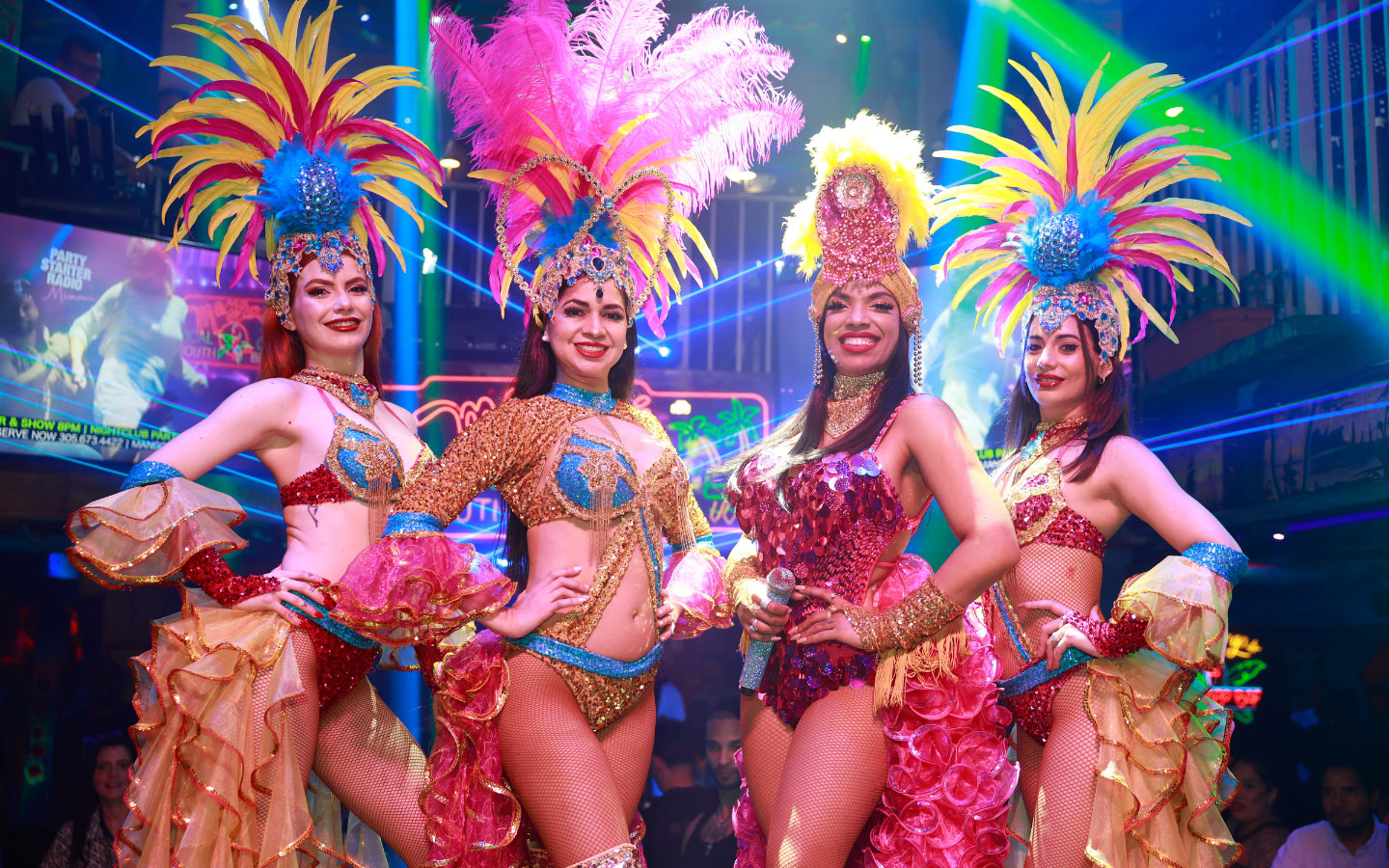 Mango's performers wearing headdresses