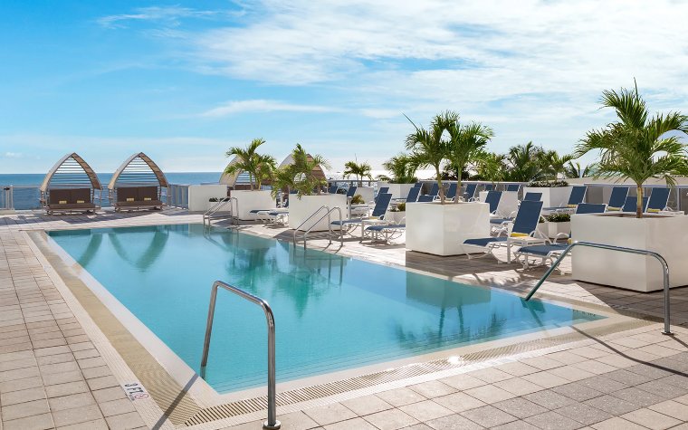 Cabanas and loungers at Hilton Cabana upper pool area